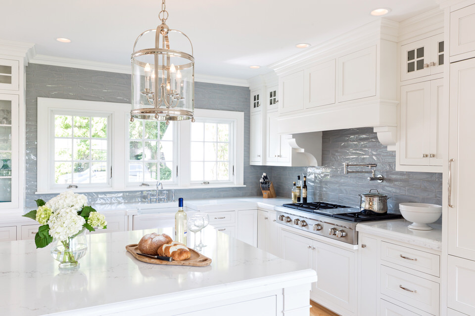 A beautiful waterfront home in Harwich showing an example of a Traditional range hood style